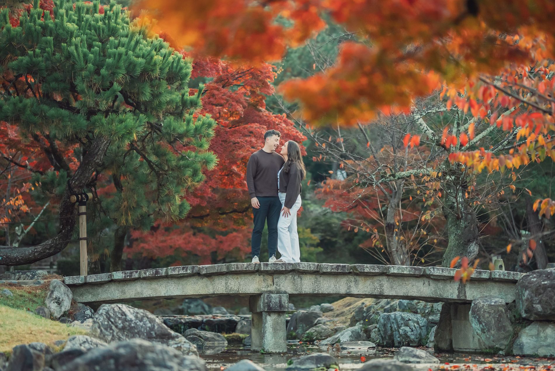 Bríd and Conor on a stone bridge